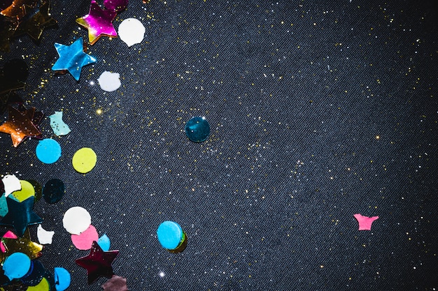 Free photo festive composition of colorful confetti