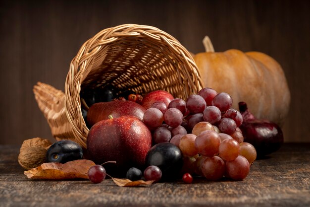 Festive cornucopia arrangement with delicious fruits