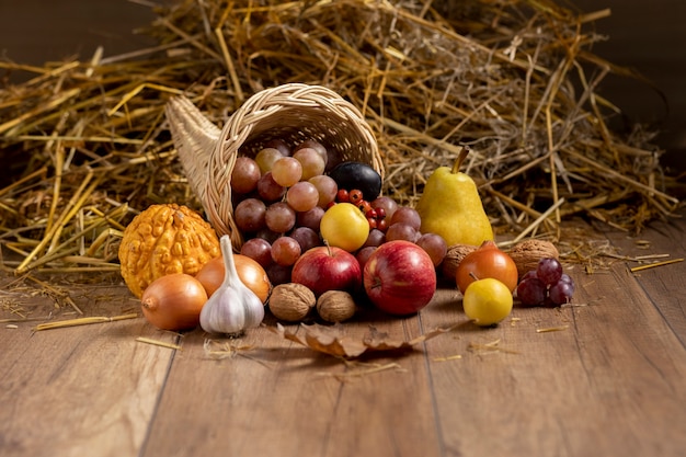 Festive cornucopia arrangement with delicious fruits
