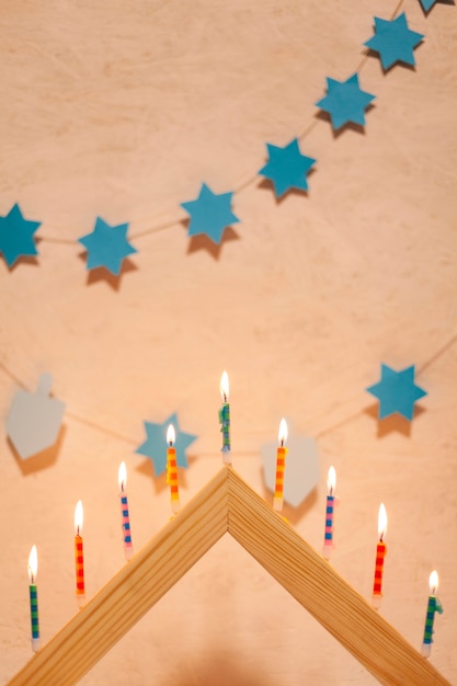 Festive hanukkah candles burning