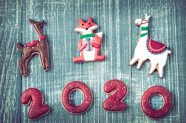 Free photo festive new year gingerbread on a wooden wall.