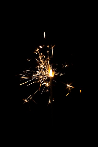 Festive shiny sparkler in the dark