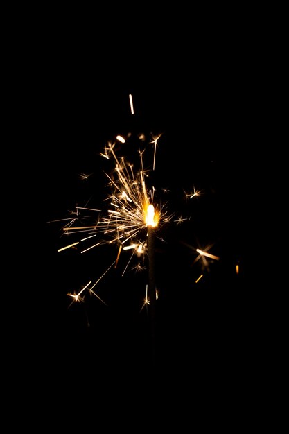 Festive shiny sparkler in the dark