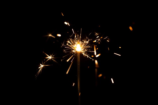 Festive shiny sparkler in the dark