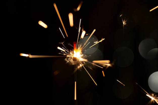 Festive shiny sparkler in the dark