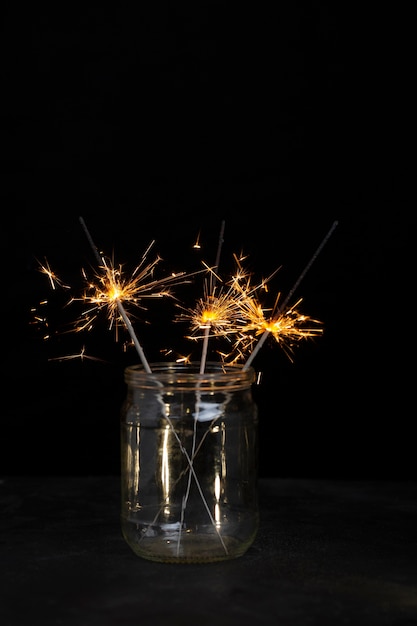 Festive shiny sparklers in a jar