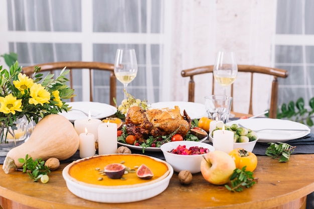 Festive table with baked chicken 