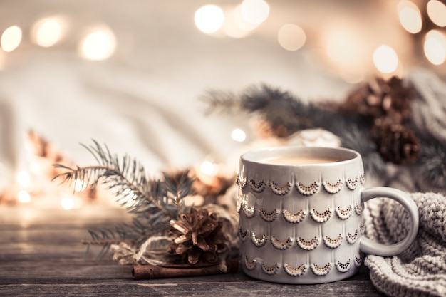 Festive wall with Cup on wooden wall with lights.