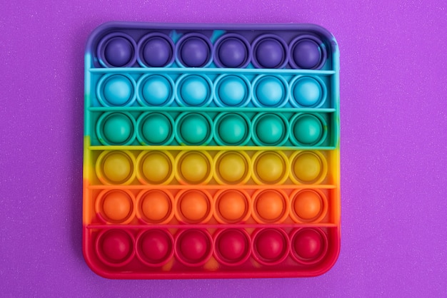 Fidget pop it toy color arcobaleno - antistress, divertente ed educativo Foto Gratuite