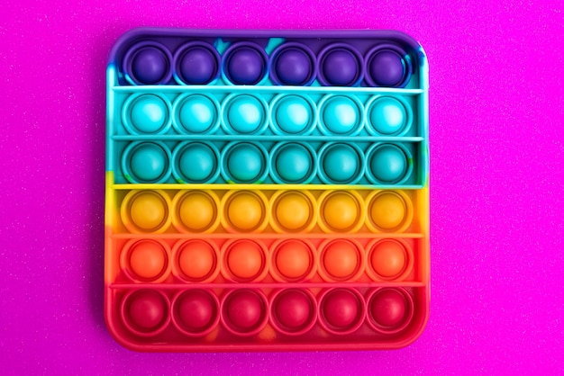Fidget pop it toy color arcobaleno, antistress, divertente ed educativo