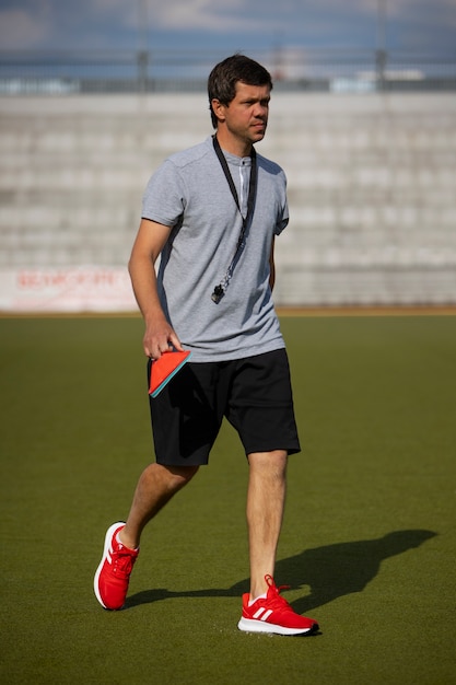 Field hockey player training and practicing the sport on grass