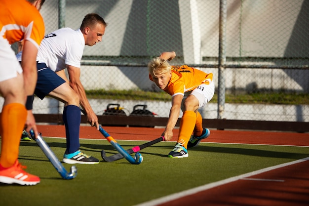 Field hockey players during a tournament game