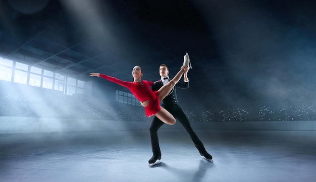 Figure skating in ice arena