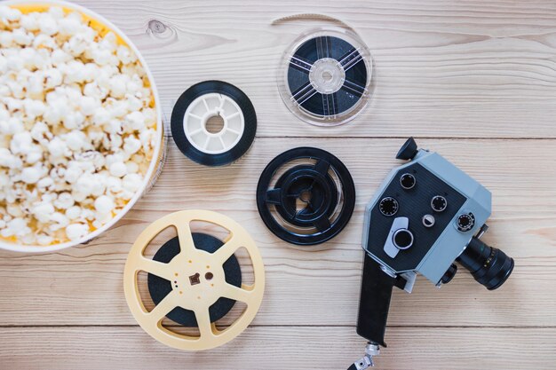 Filmstrips with popcorn and camera