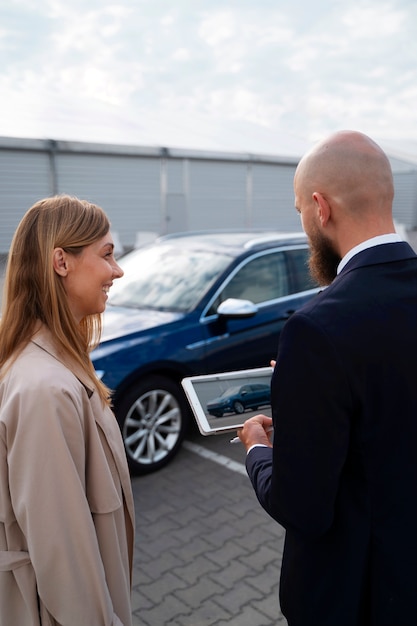 Financial independent woman buying new car