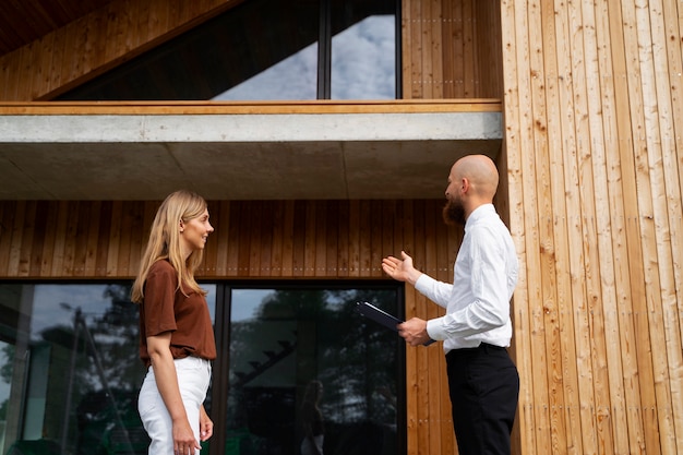 Free photo financial independent woman buying new house