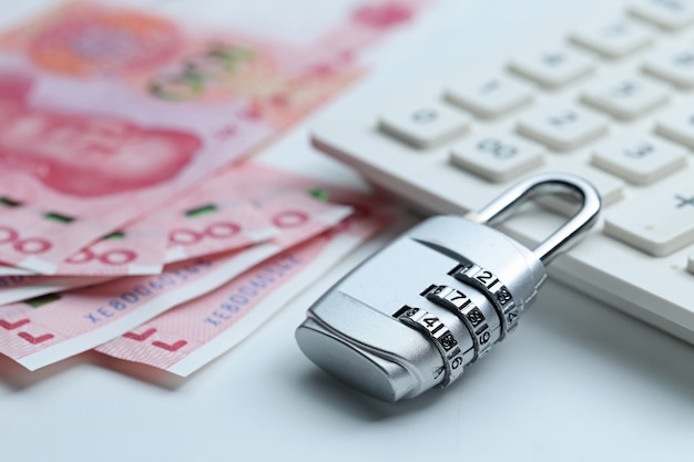 Financial security Password lock and banknotes on white background