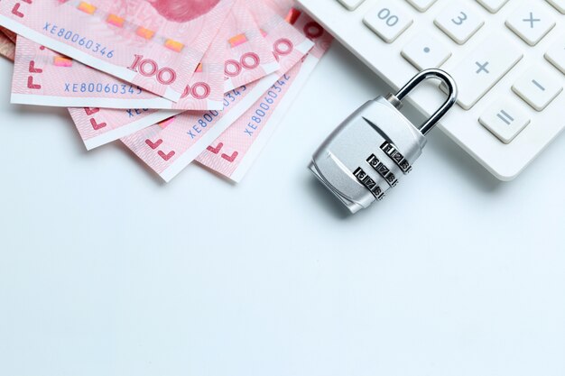 Financial security Password lock and banknotes on white background