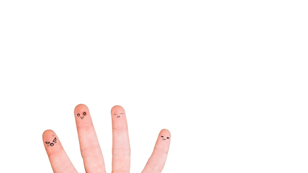 Fingers with faces on white