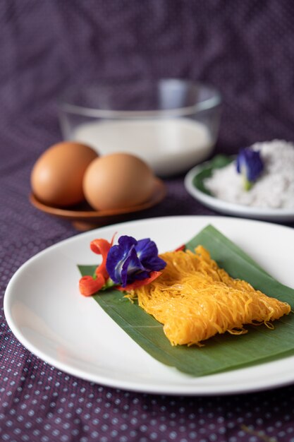 The Fios de ovos on the plate consists of two eggs and coconut milk.