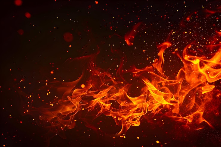 Free Photo fire flame with sparkle in black background