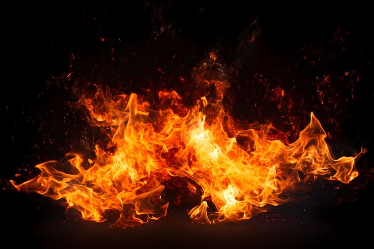 Free Photo fire flame with sparkle on black background
