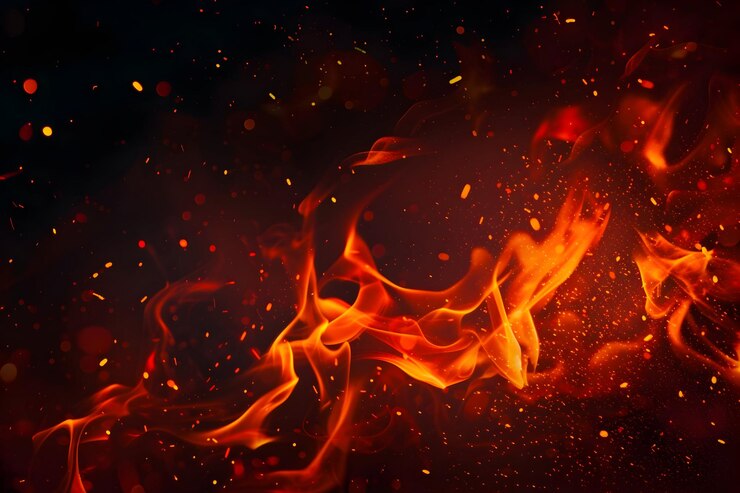 Free Photo fire flame with sparkle in black background