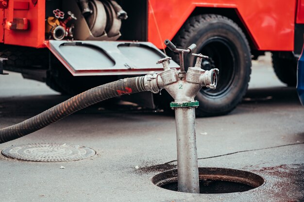 Fire Hydrant In Use During a Structure Fire