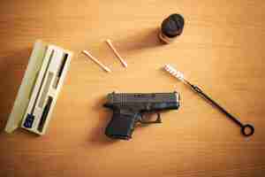 Free photo firearm cleaning and maintenance after use at shooting range