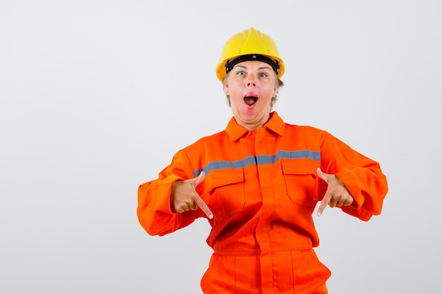 Firewoman in her uniform with a safety helmet