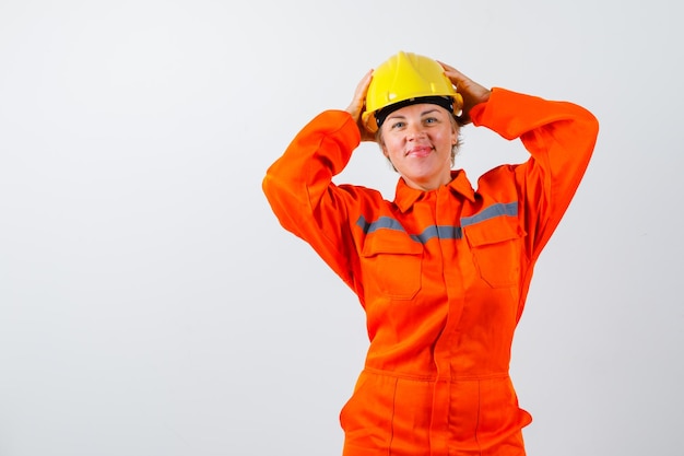 Firewoman in her uniform with a safety helmet