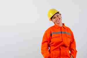 Free photo firewoman in her uniform with a safety helmet