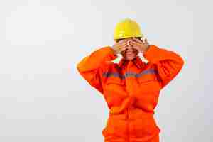 Free photo firewoman in her uniform with a safety helmet