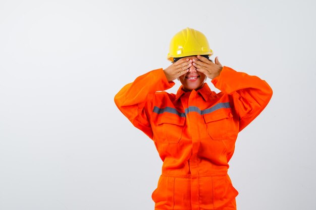 Firewoman in her uniform with a safety helmet