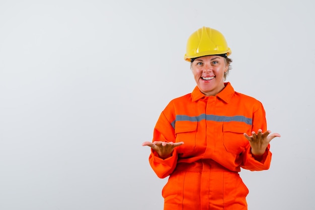 Firewoman in her uniform with a safety helmet