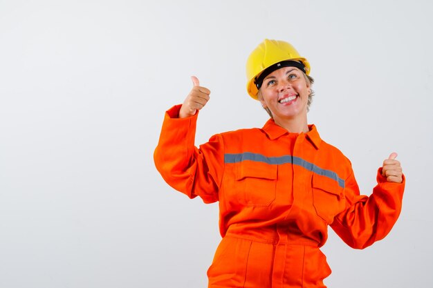 Firewoman in her uniform with a safety helmet