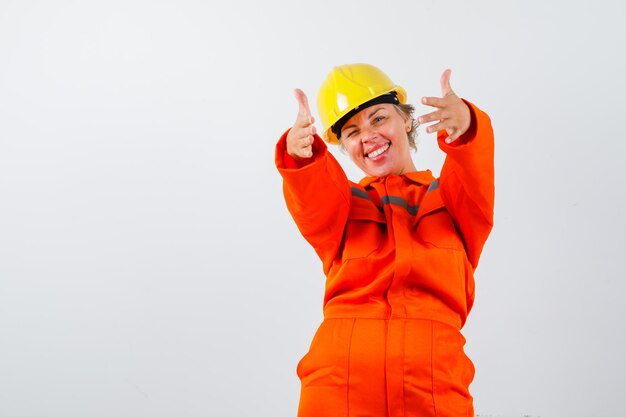 Firewoman in her uniform with a safety helmet