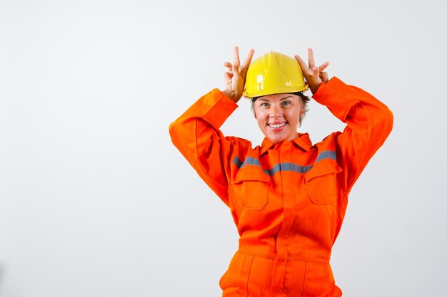 Firewoman in her uniform with a safety helmet