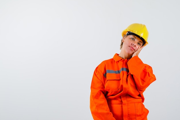 Firewoman in her uniform with a safety helmet