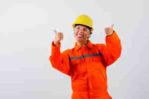 Free photo firewoman in her uniform with a safety helmet