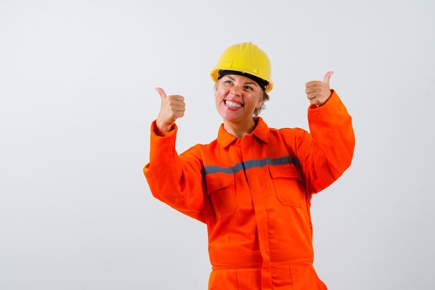 Firewoman in her uniform with a safety helmet