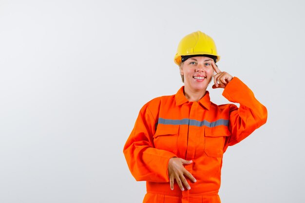 Firewoman in her uniform with a safety helmet