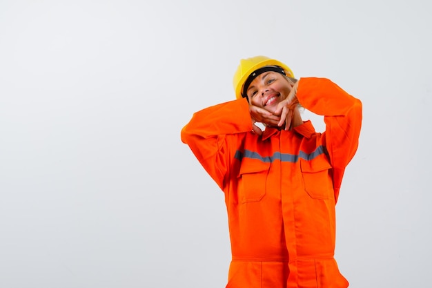 Firewoman in her uniform with a safety helmet