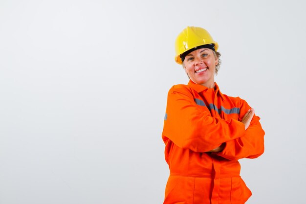 Firewoman in her uniform with a safety helmet