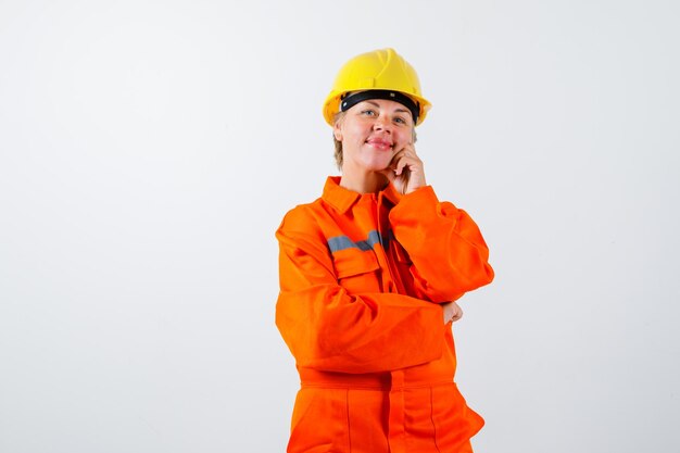 Firewoman in her uniform with a safety helmet