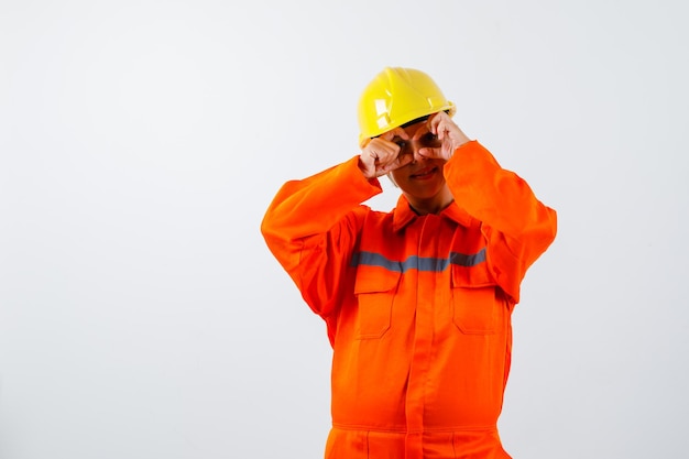 Free photo firewoman in her uniform with a safety helmet