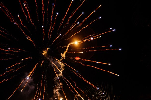 Fireworks fly like arrows in night sky