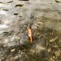 Foto gratuita amo da pesca nel fiume