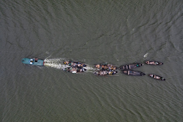 Free photo fishing boats, floating the calm waters and going for fishing