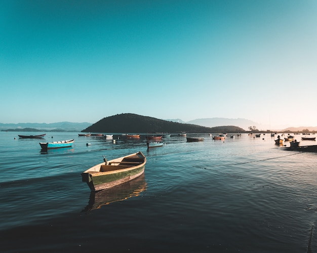 Fishing boats on the water in the sea with beautiful clear blue sky